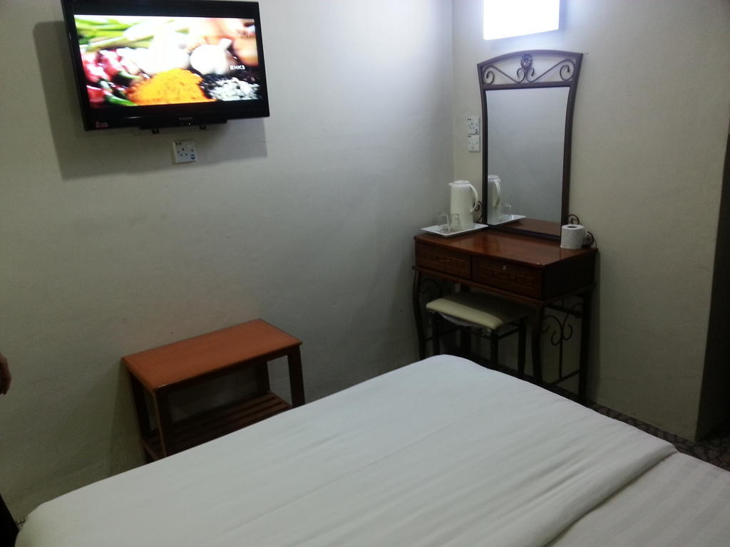 Oriental Inn Kuching Quarto foto