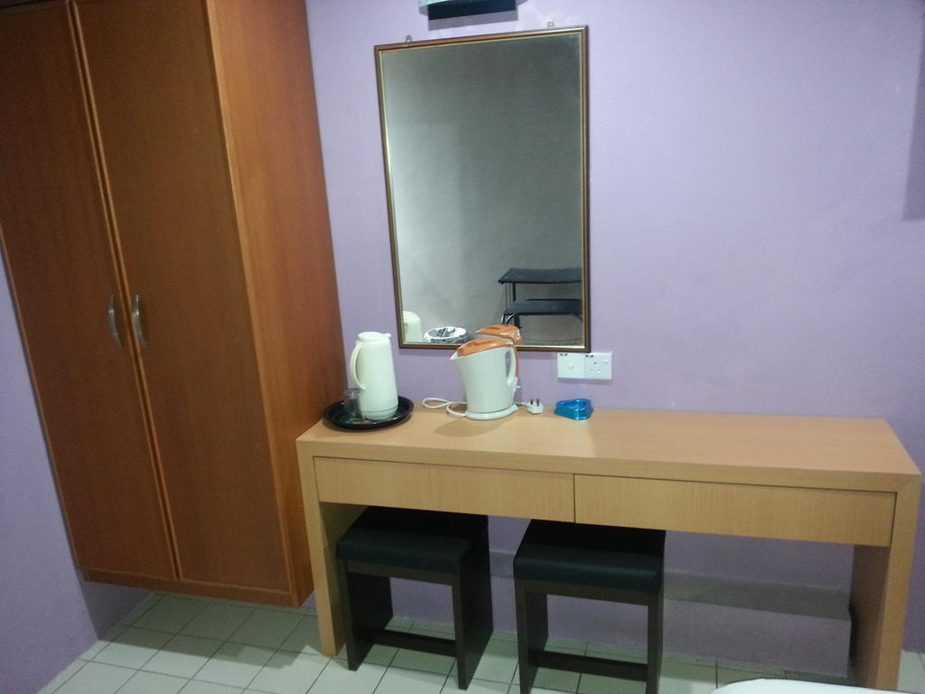 Oriental Inn Kuching Quarto foto